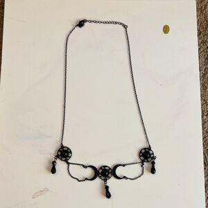 Elegant Black Necklace with Charms